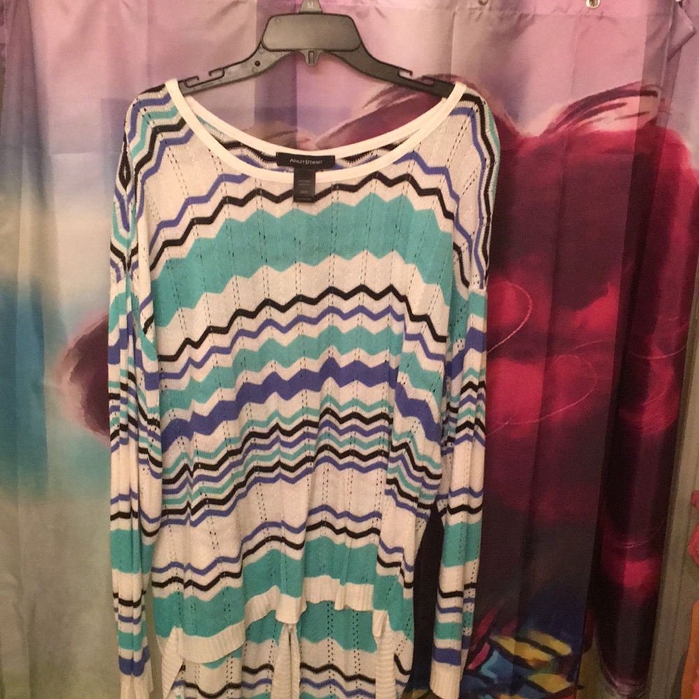 Plus size long sleeve blue multicolored sweater .